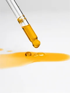 golden face oil dropper texture, nourishing organic facial oil with botanical oils for hydrated radiant smooth and youthful skin
