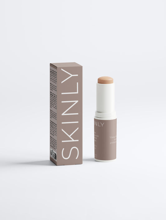 SKINLY tinted SPF 50 sunscreen stick, mineral sun protection with natural finish, travel-friendly sun care for smooth and protected skin