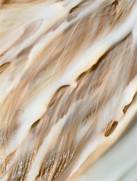 volumizing conditioner texture on hair strands, strengthening and detangling formula for fuller thicker smooth healthy hair