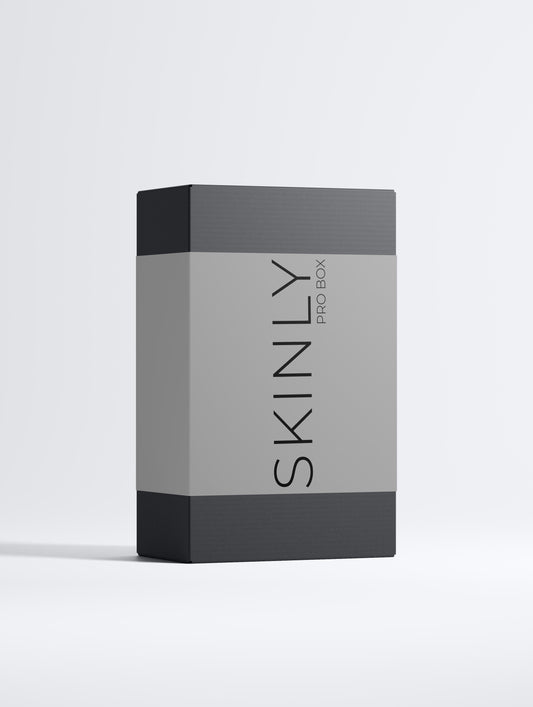 SKINLY Pro Box luxury skincare set in elegant black packaging, premium beauty gift box for glowing healthy skin routine